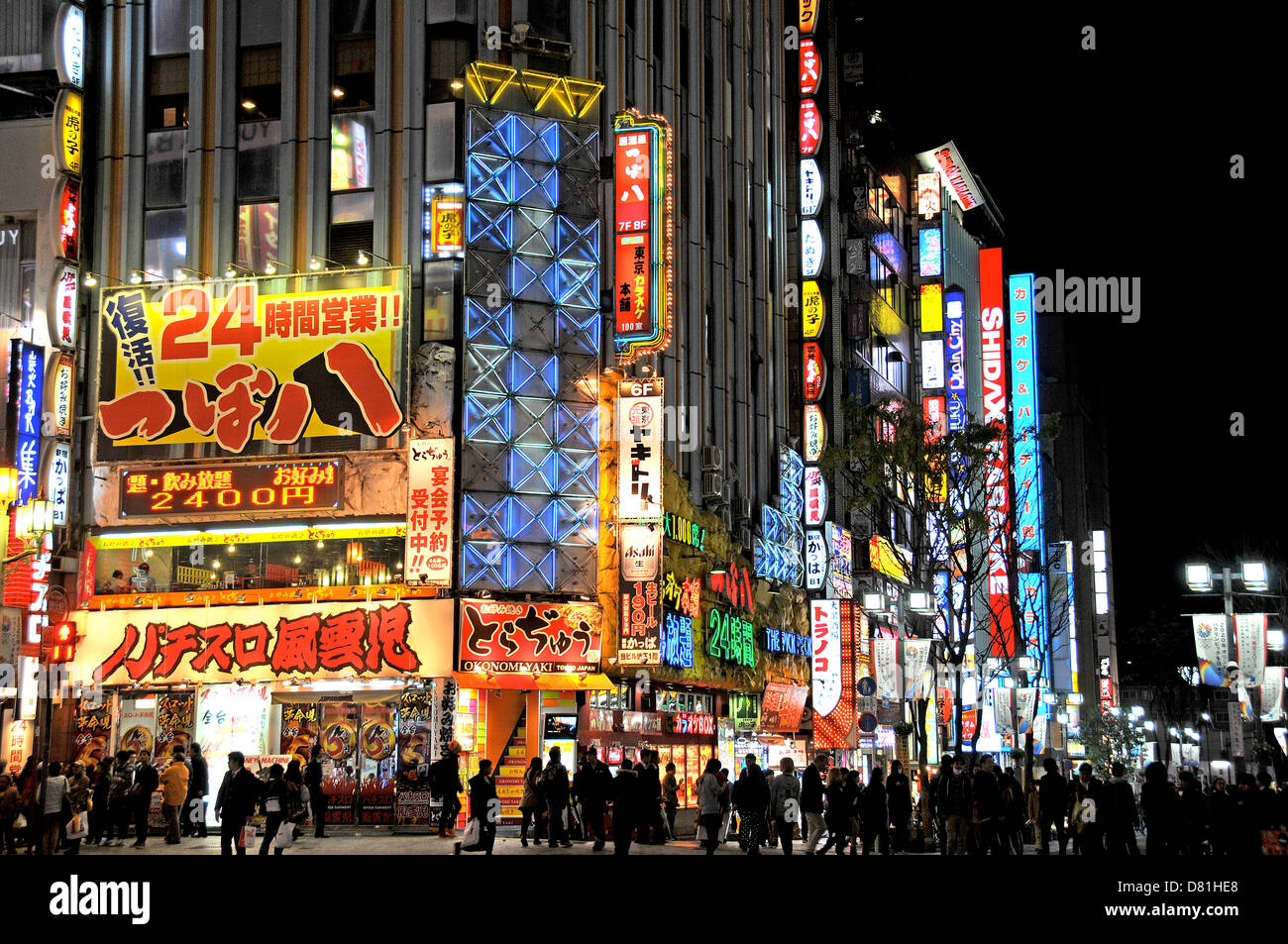 street scene by night Shinjuku Tokyo Japan Asia Stock Photo