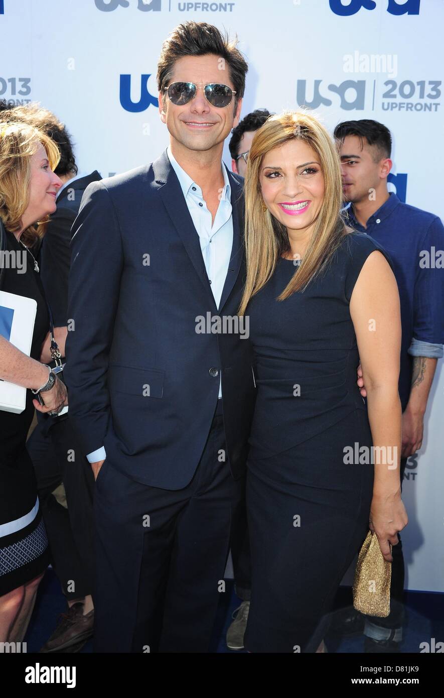 New York, NY, USA. May 16, 2013. John Stamos, Callie Thorne at arrivals for  USA Network 2013 Upfront Event, Pier 36 - Basketball City, New York, NY May  16, 2013. Photo By: