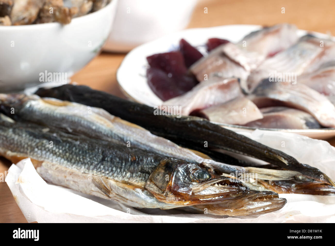 Fish On Table Assorted fish on wooden table Stock Photo - Alamy