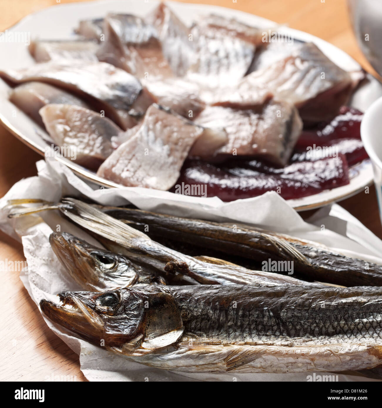 Seafood theme. Macro photo of assorted fish on wooden table Stock Photo
