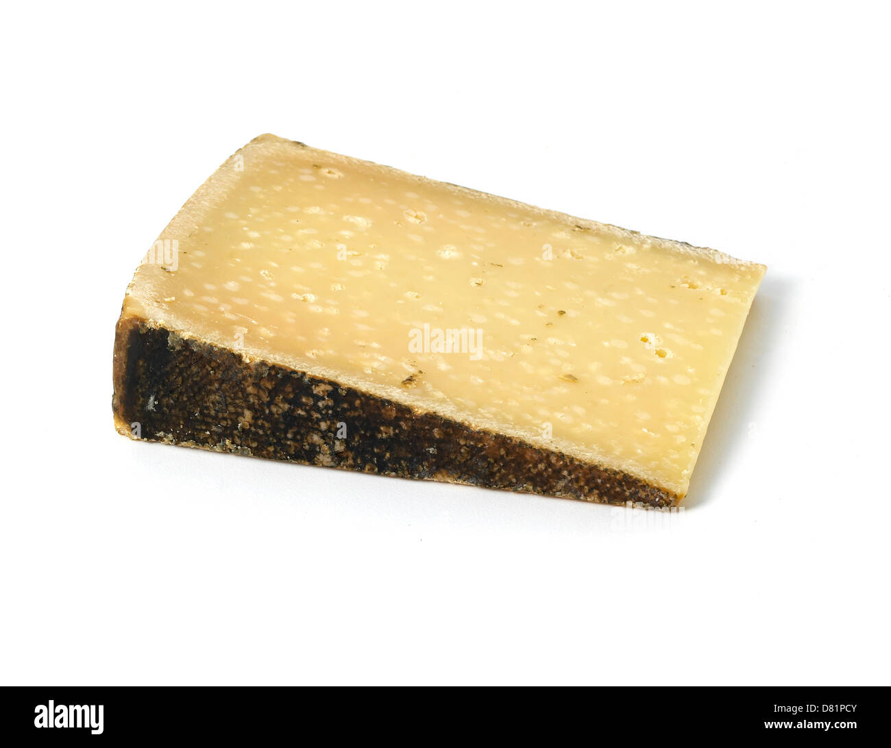 wedge of cheese cut out against a white background Stock Photo