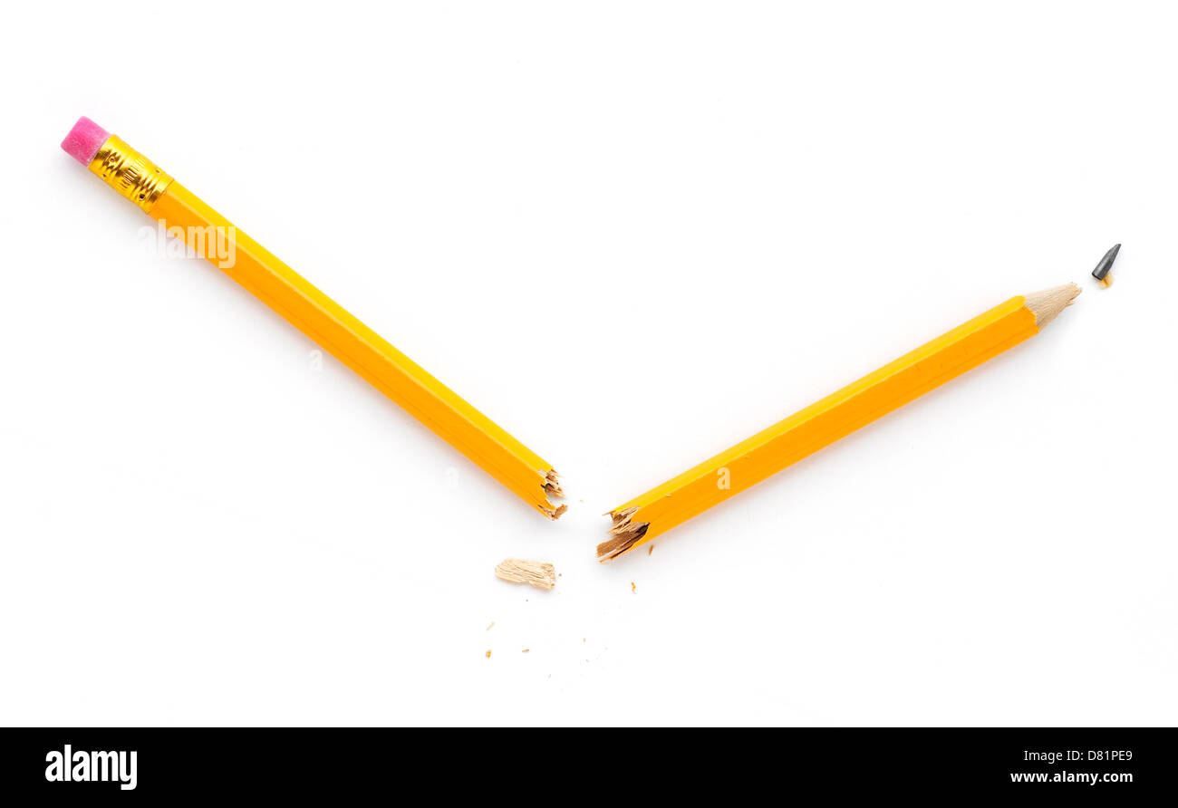 snapped yellow pencil cut out onto a white background Stock Photo