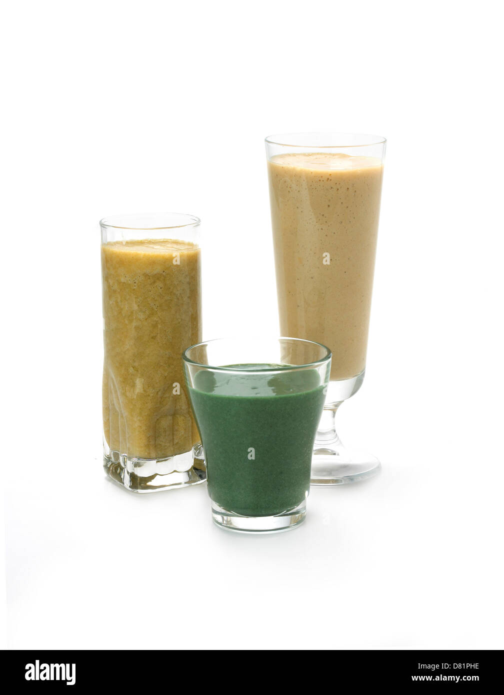 colored smoothies in different glasses cut out against a white background Stock Photo