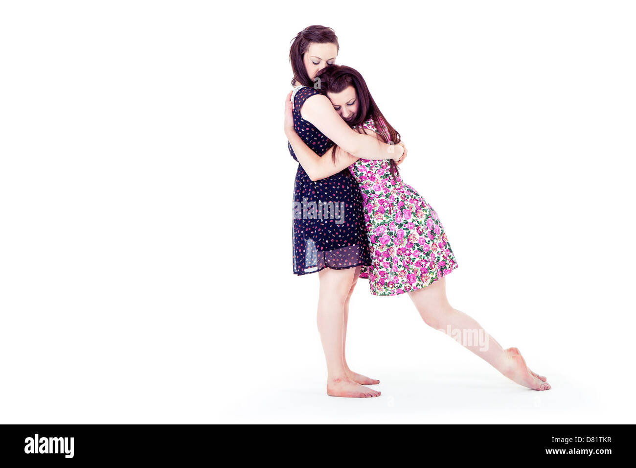 two female dancers embracing Stock Photo