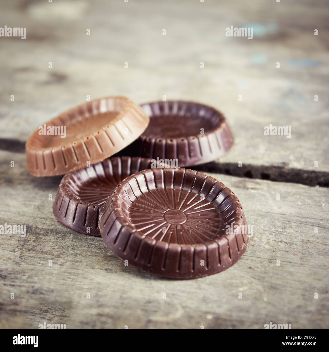 chocolate bar on a wooden table, close up photo Stock Photo