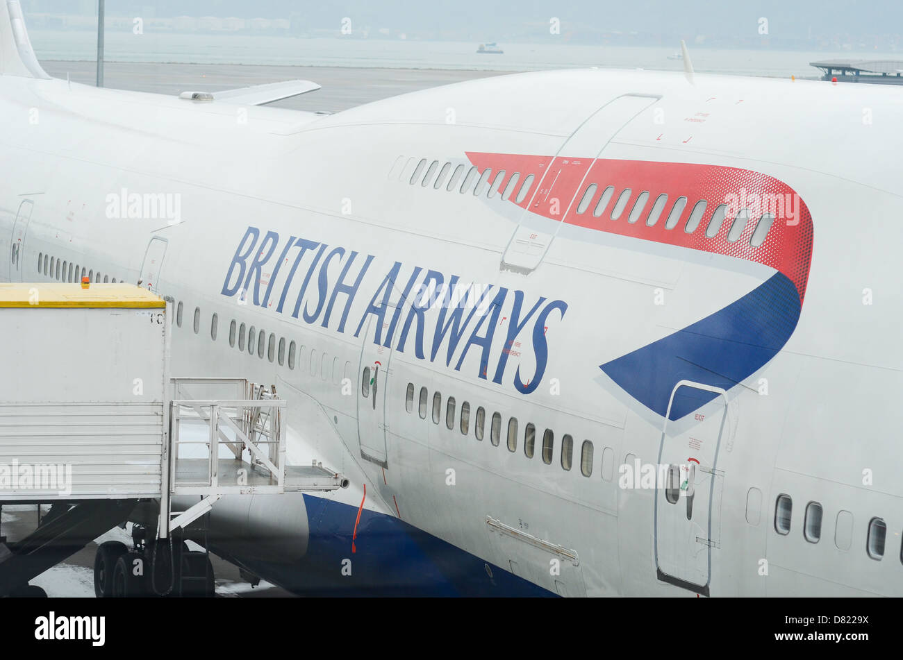 The side of a British Airways passenger plane. Stock Photo