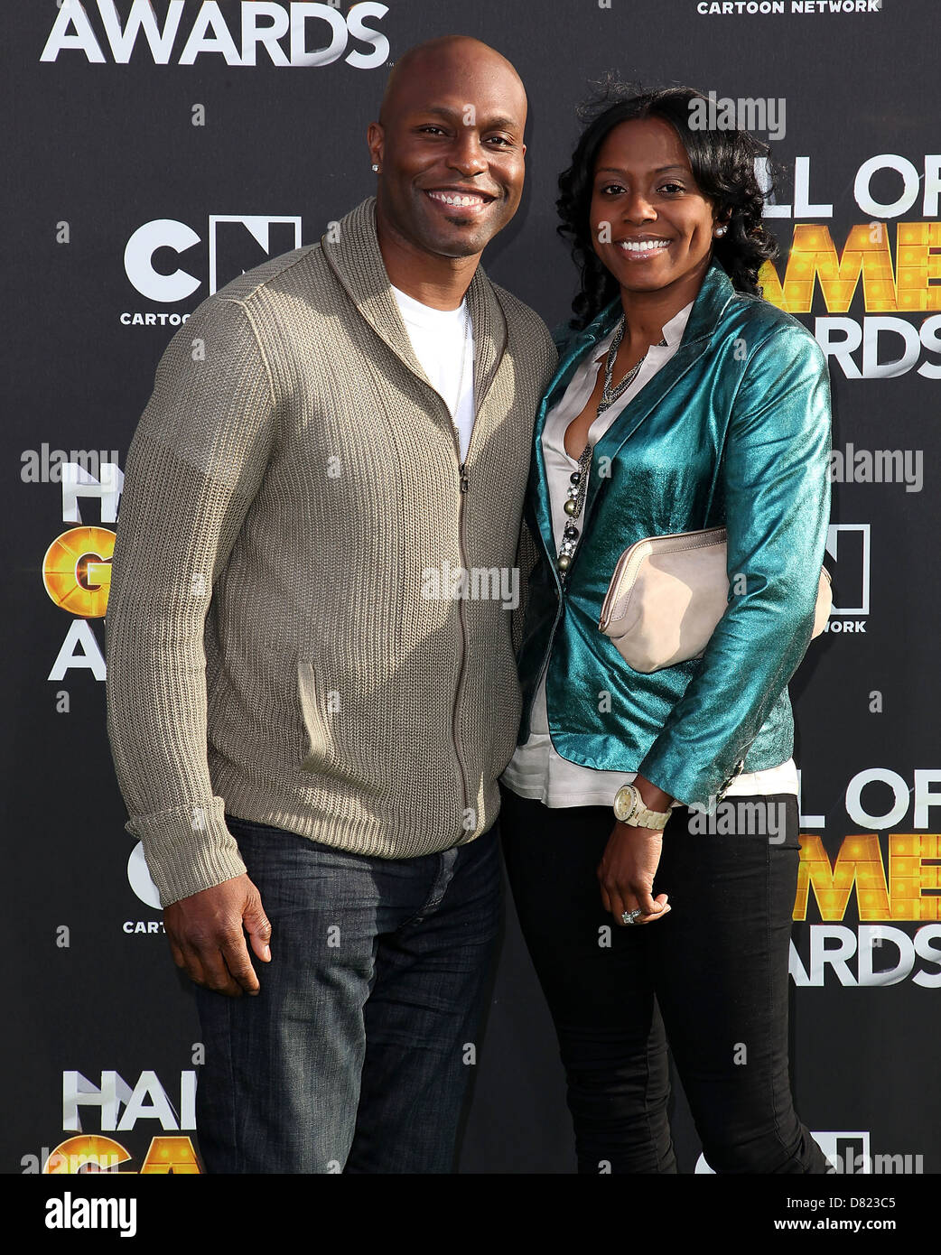player Torii Hunter and wife Katrina arrive at the 2012 Cartoon, WireImage