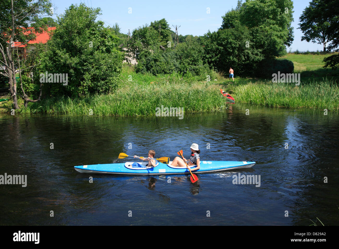 Paddling at  Krutynia River, Masurian Lake District, Poland Stock Photo