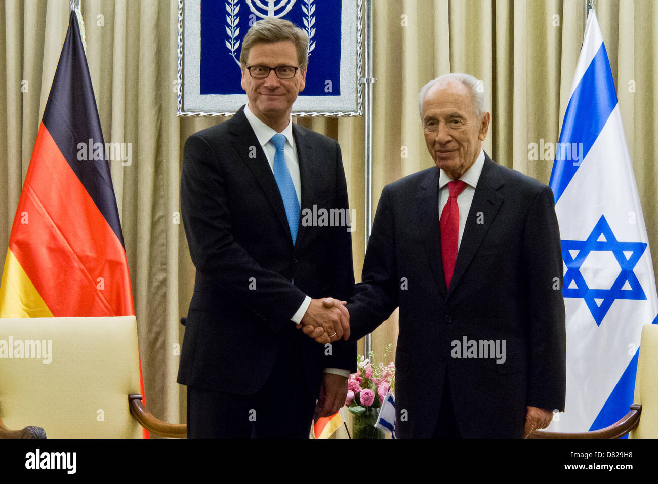 Jerusalem, Israel. 17th May 2013. Israeli President Shimon Peres (R) shakes hands with Minister of Foreign Affairs of the Federal Republic of Germany, Guido Westerwelle (L), at the onset of a diplomatic work meeting at the Presidents' Residence. Jerusalem, Israel. 17-May-2013.  Israeli President Shimon Peres hosts Minister of Foreign Affairs of the Federal Republic of Germany, Guido Westerwelle, for a diplomatic work meeting at the Presidents' Residence. Credit:  Nir Alon / Alamy Live News Stock Photo