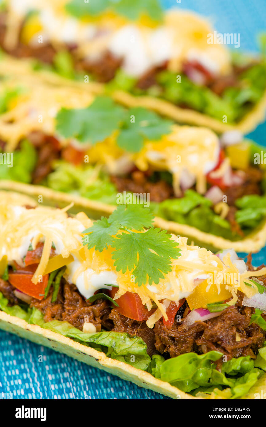Beef Tacos Shredded beef taco trays topped with salsa, sour cream and