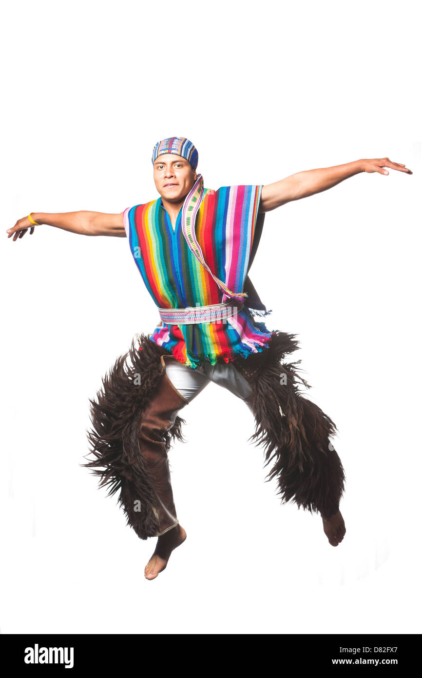 Ecuadorian Dancer Dressed Up In Traditional Clothing From The Andes Performing A Jump Llama Or Alpaca Pants Studio Shot Isolated On White Stock Photo