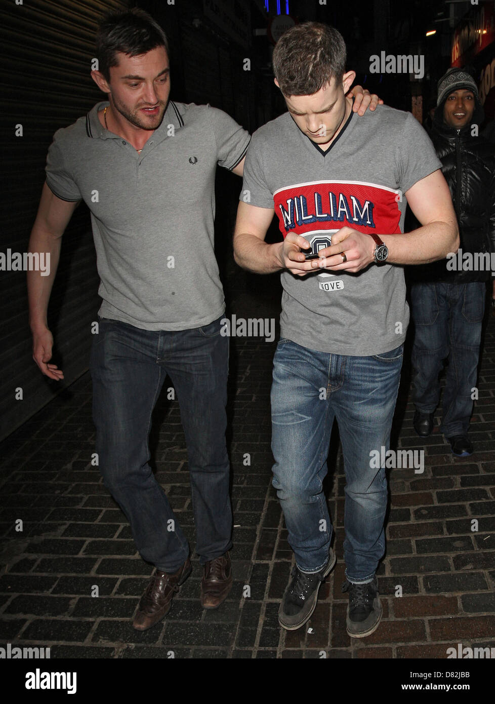 Russell Tovey is thrown out by the bouncers at The Box nightclub in Soho. London, England - 17.02.12 Stock Photo