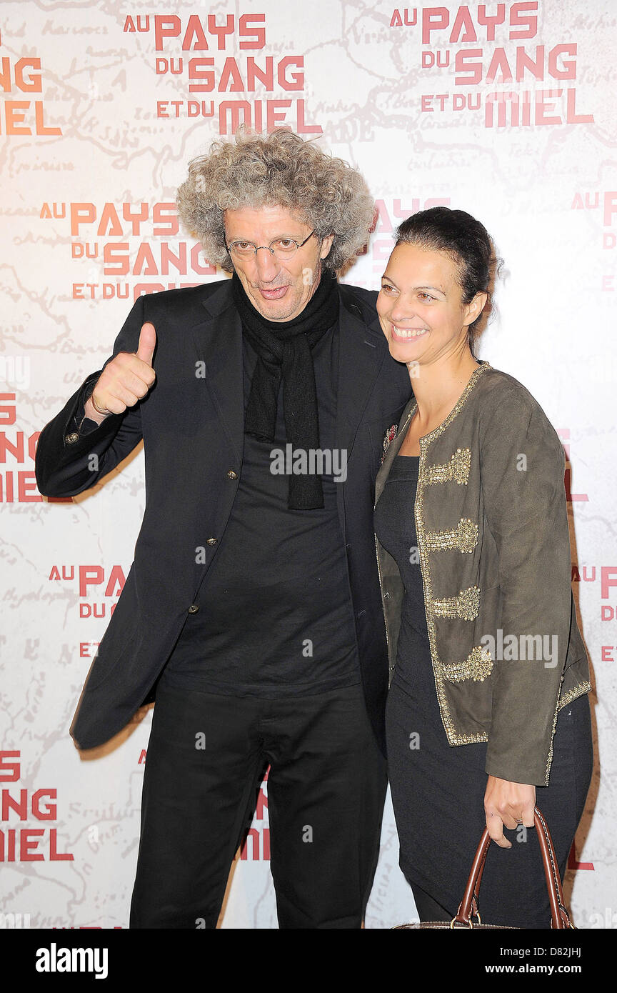 Elie Chouraqui and Isabelle Giordano , at the 'In The Land Of Blood And Honey' Paris premiere at Cinema MK2 Bibliotheque. Paris, France - 16.02.12 Stock Photo