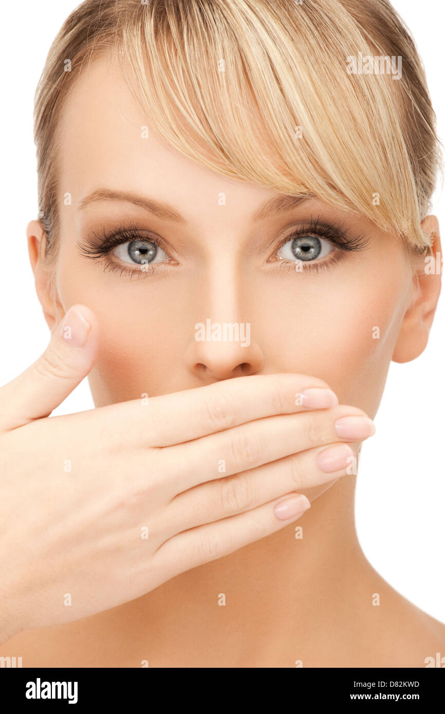 woman covering her mouth Stock Photo