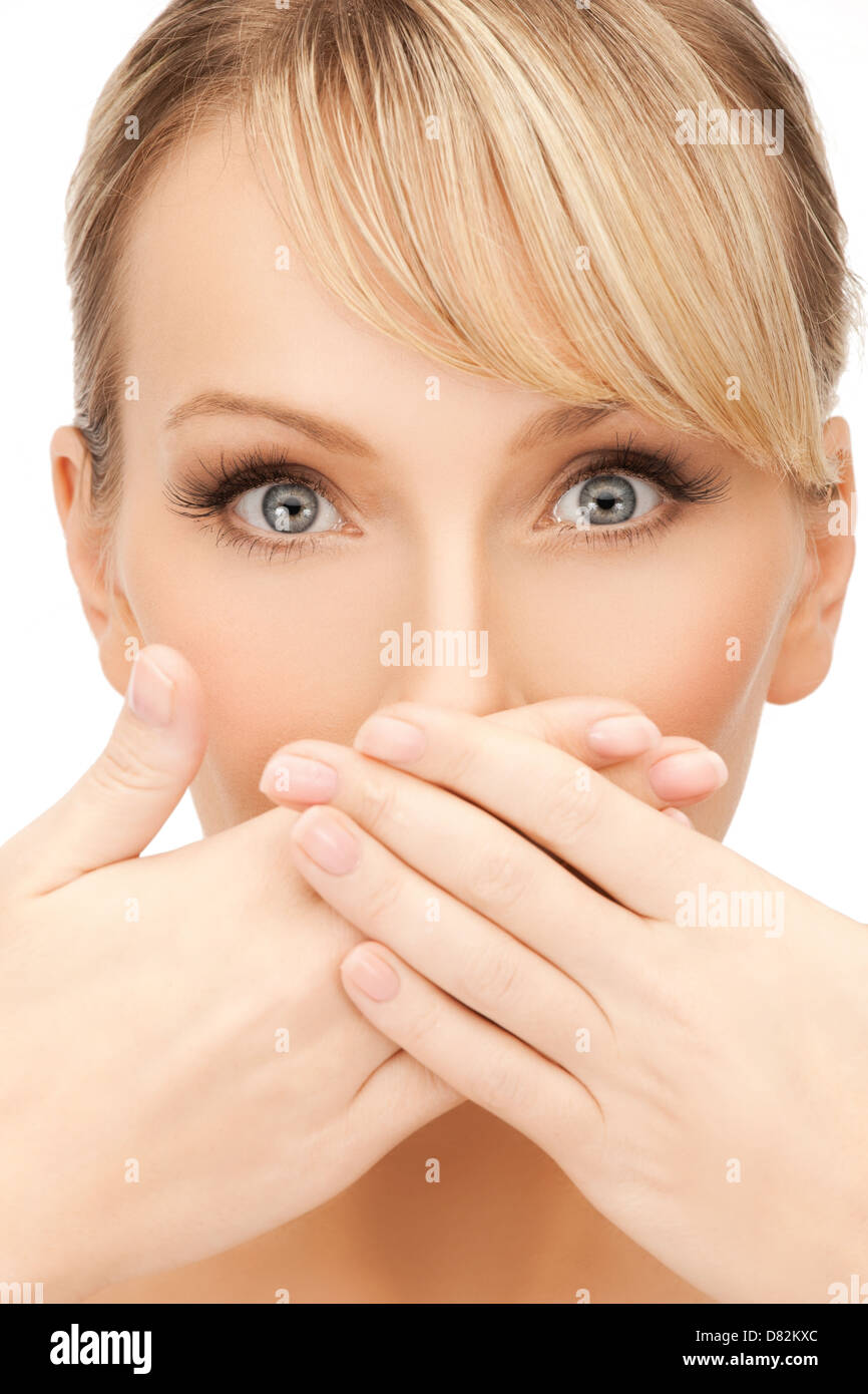 woman covering her mouth Stock Photo