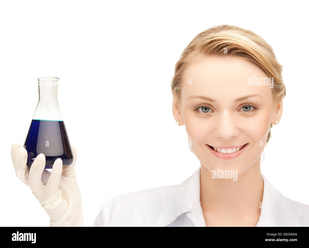 female chemist holding bulb with chemicals Stock Photo