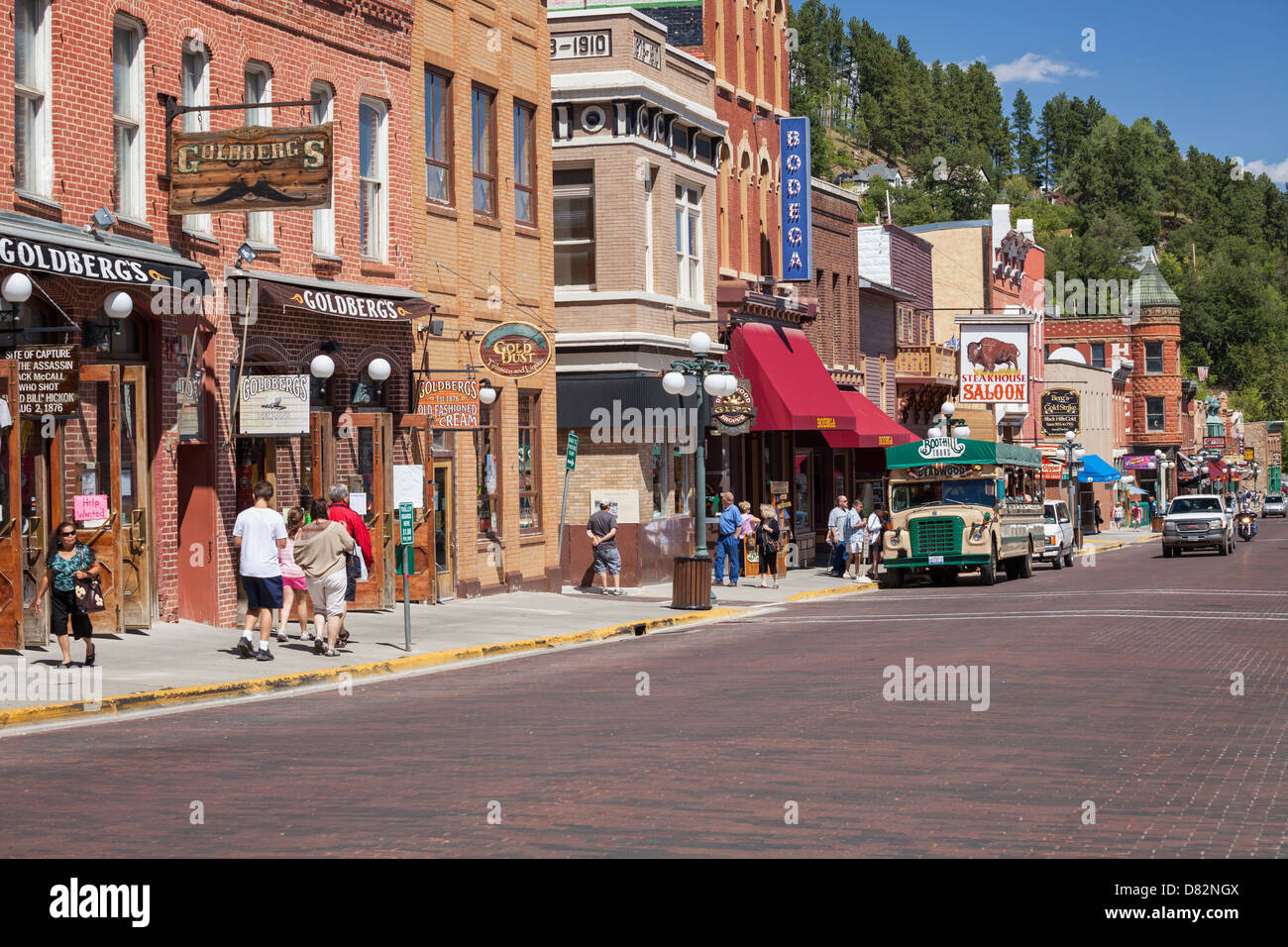 Tourist explore Main Street in historic Deadwood, South Dakota Stock