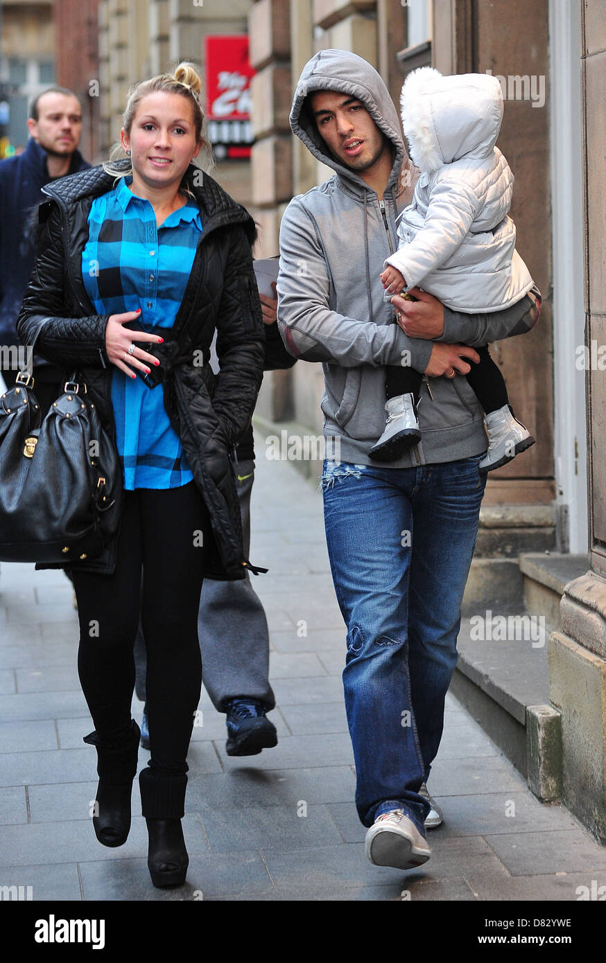 Luis Suarez with his wife Sofia and daughter Delfina enjoyed an early Valentine's lunch at the San Carlo restaurant in Stock Photo