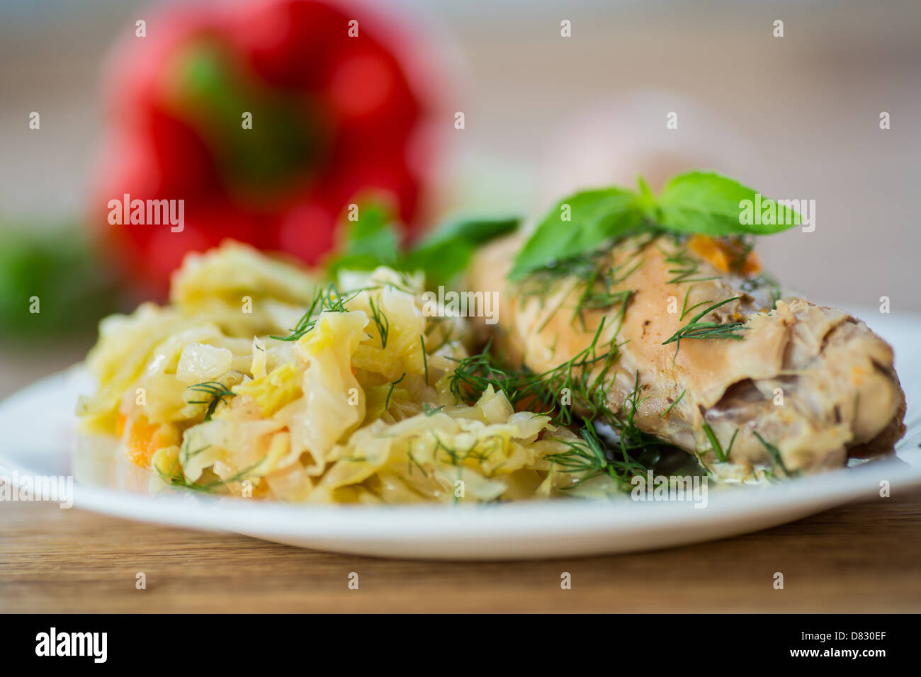 cabbage stew with rabbit meat and vegetables Stock Photo