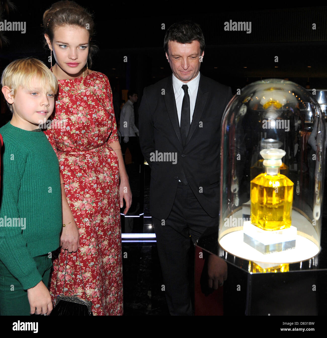 LVMH luxury group CEO Bernard Arnault, center, flanked by his daughter  Delphine Arnault, left, and his son Antoine Arnault as they attend the  opening of the exhibition 'The Morozov Collection, Icons of
