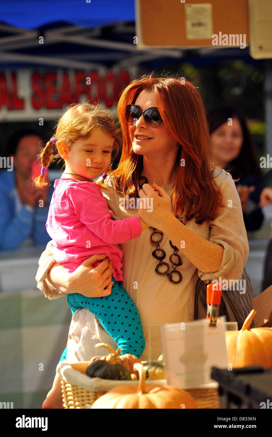 Pregnant Alyson Hannigan and her daughter Satanya Denisof at a farmers