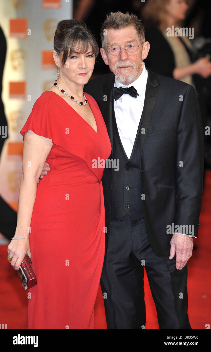 John Hurt and Sinead Cusack Orange British Academy Film Awards (BAFTAs) held at the Royal Opera House - Arrivals London, Stock Photo