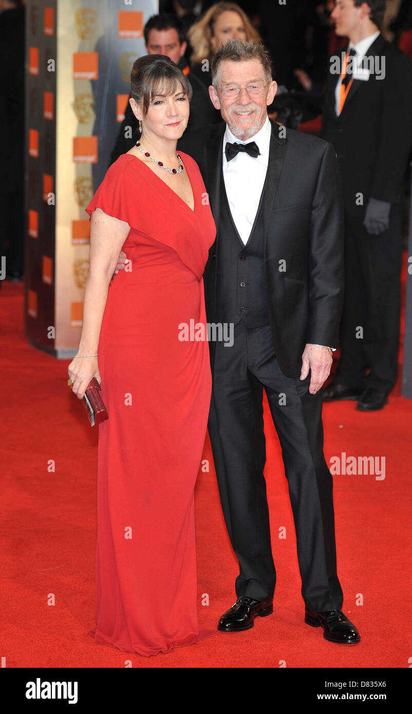 John Hurt and Sinead Cusack Orange British Academy Film Awards (BAFTAs) held at the Royal Opera House - Arrivals London, Stock Photo
