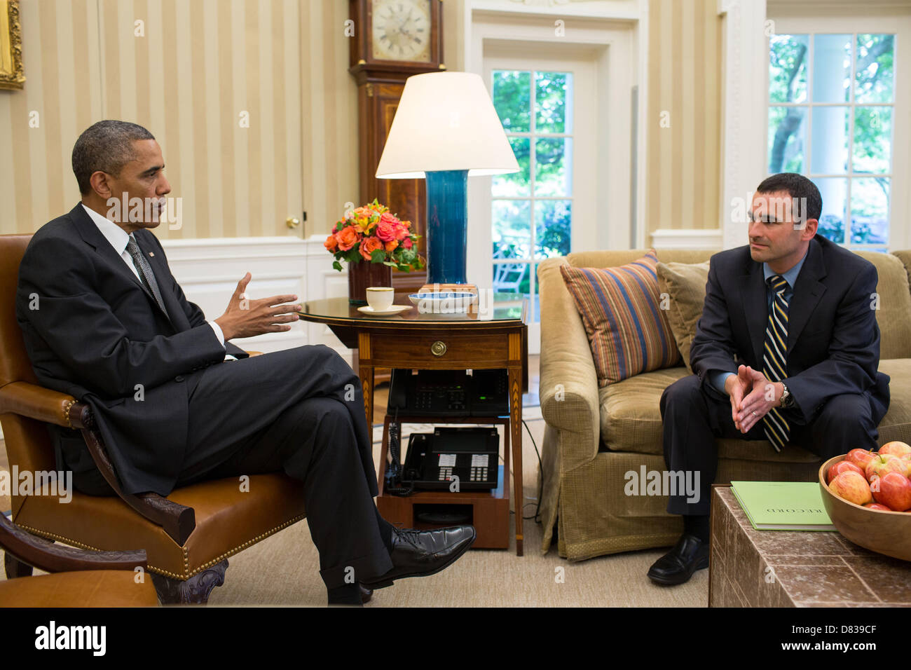 US President Barack Obama meets with Danny Werfel, incoming Acting IRS Commissioner in the Oval Office of the White House May 17, 2013 in Washington, DC. Stock Photo