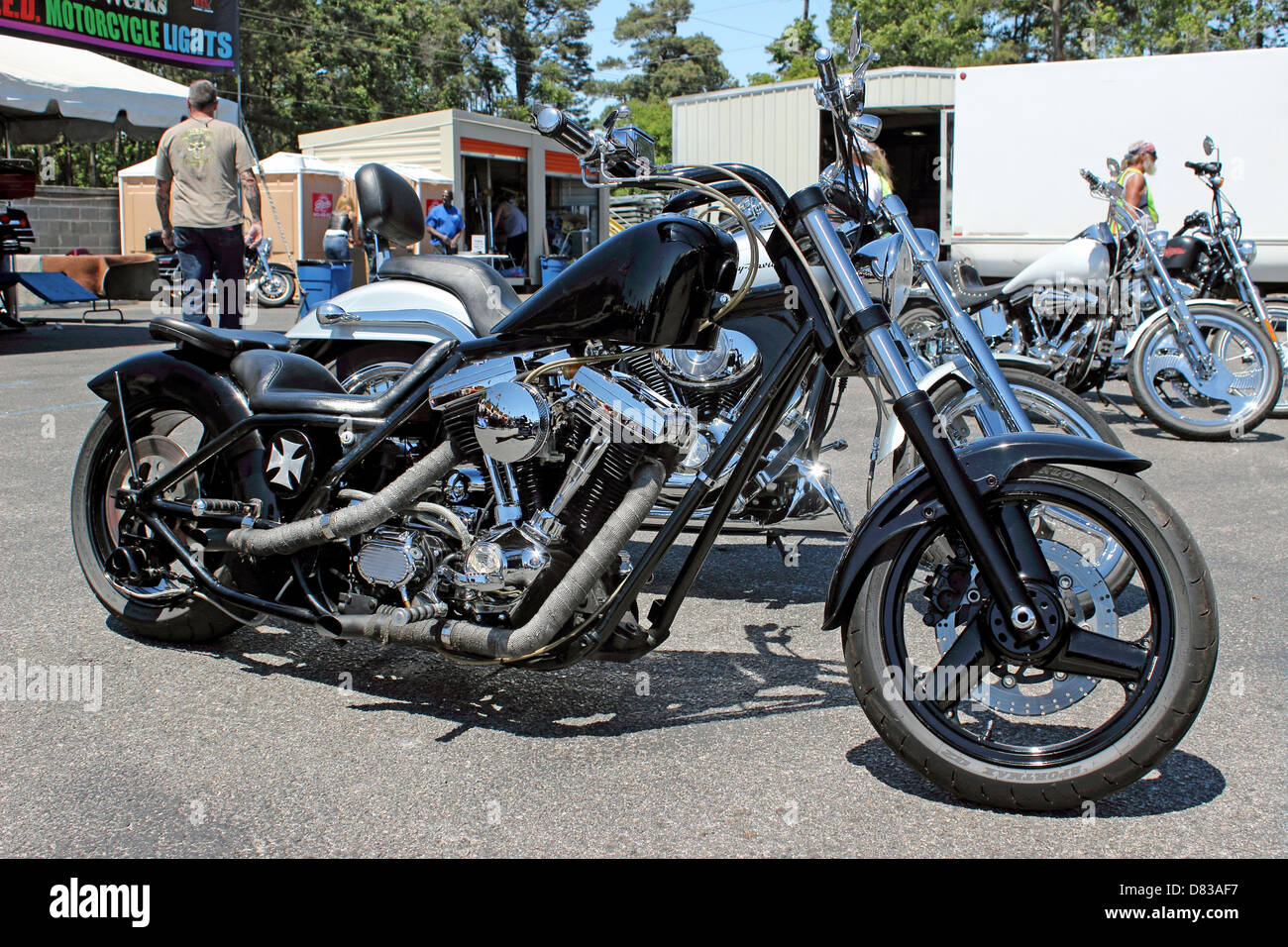 A custom black Harley Davidson motorcycle with iron cross design at Myrtle Beach Bike Week 2013, May 14th 2013 Stock Photo