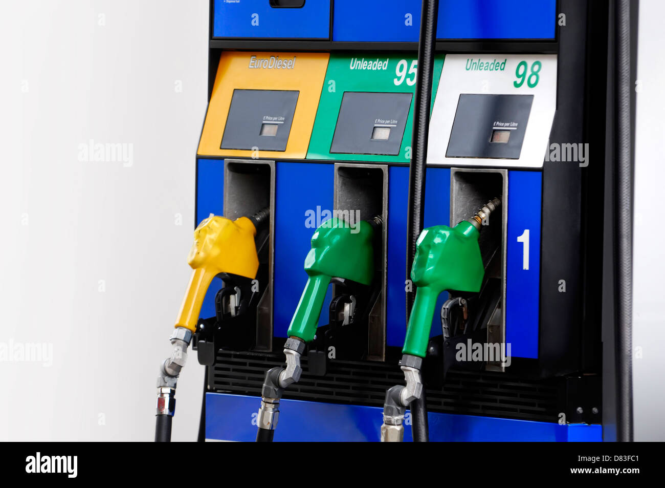 Gas pump nozzles with diesel, 95 and 98 petrol closeup Stock Photo Alamy