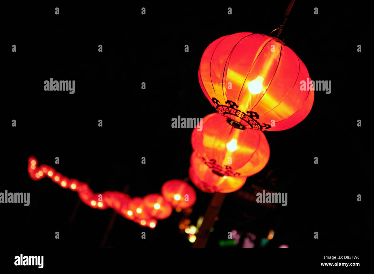 Chinese Lanterns glowing at night Stock Photo Alamy