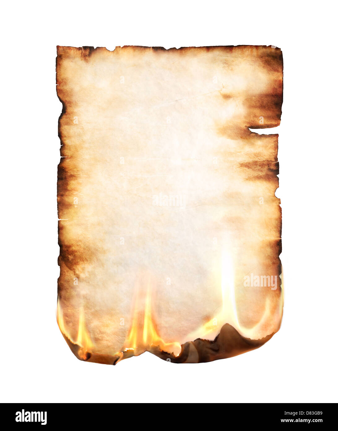 Burning blank piece of yellowish stained parchment isolated on white background Stock Photo