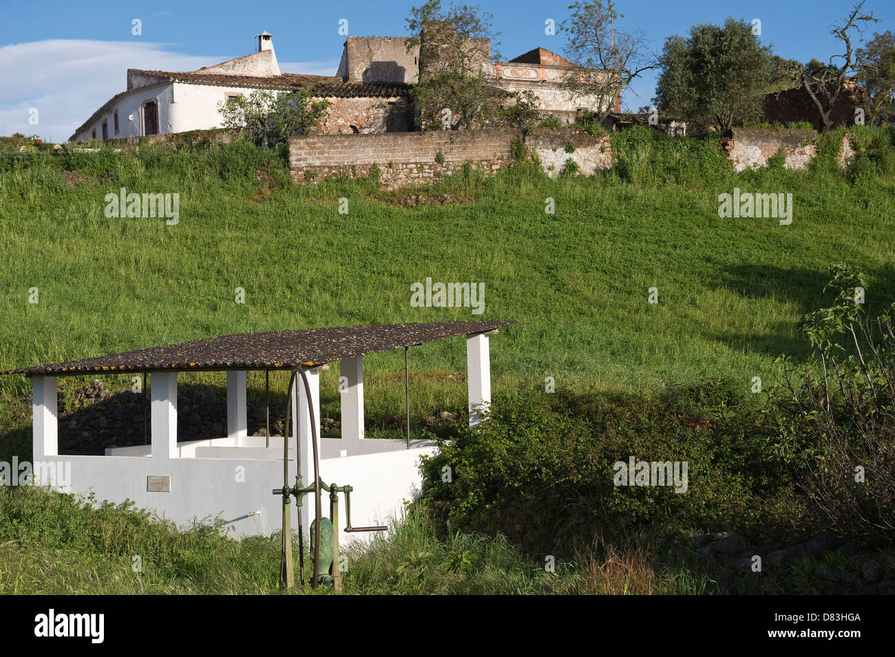 Public laundry build in 1988 and water wheel Ferrobo Sao Bras de Alportel Algarve Portugal