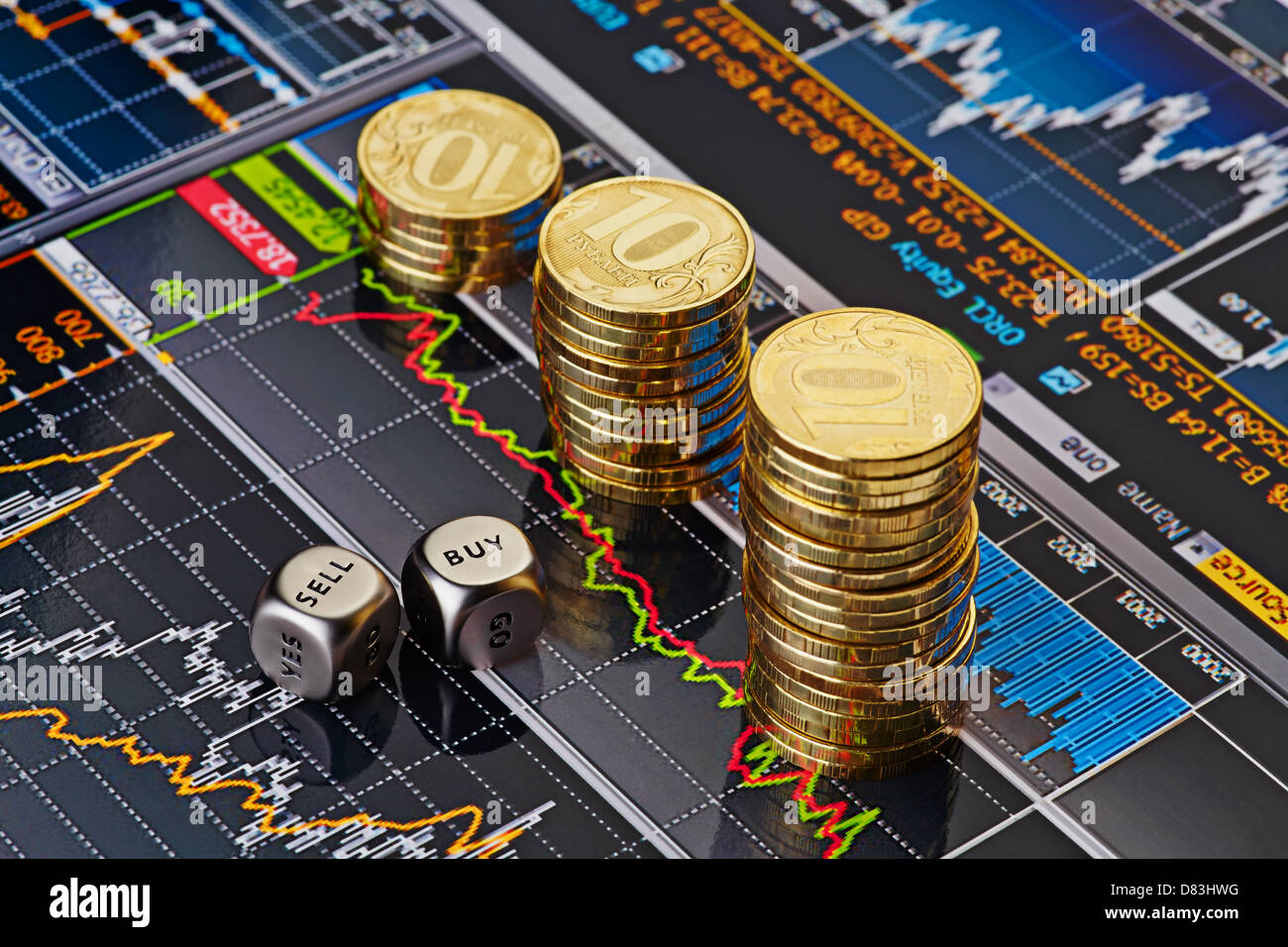 Dices cubes with the words SELL BUY, Uptrend stacks of golden coins. Financial chart as background. Selective focus Stock Photo