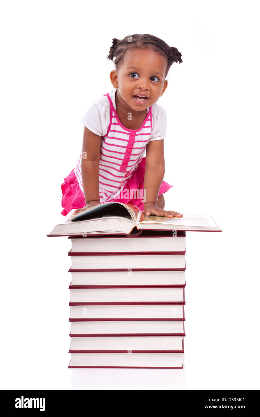 Cute black african american little girl reading a book, isolated on ...