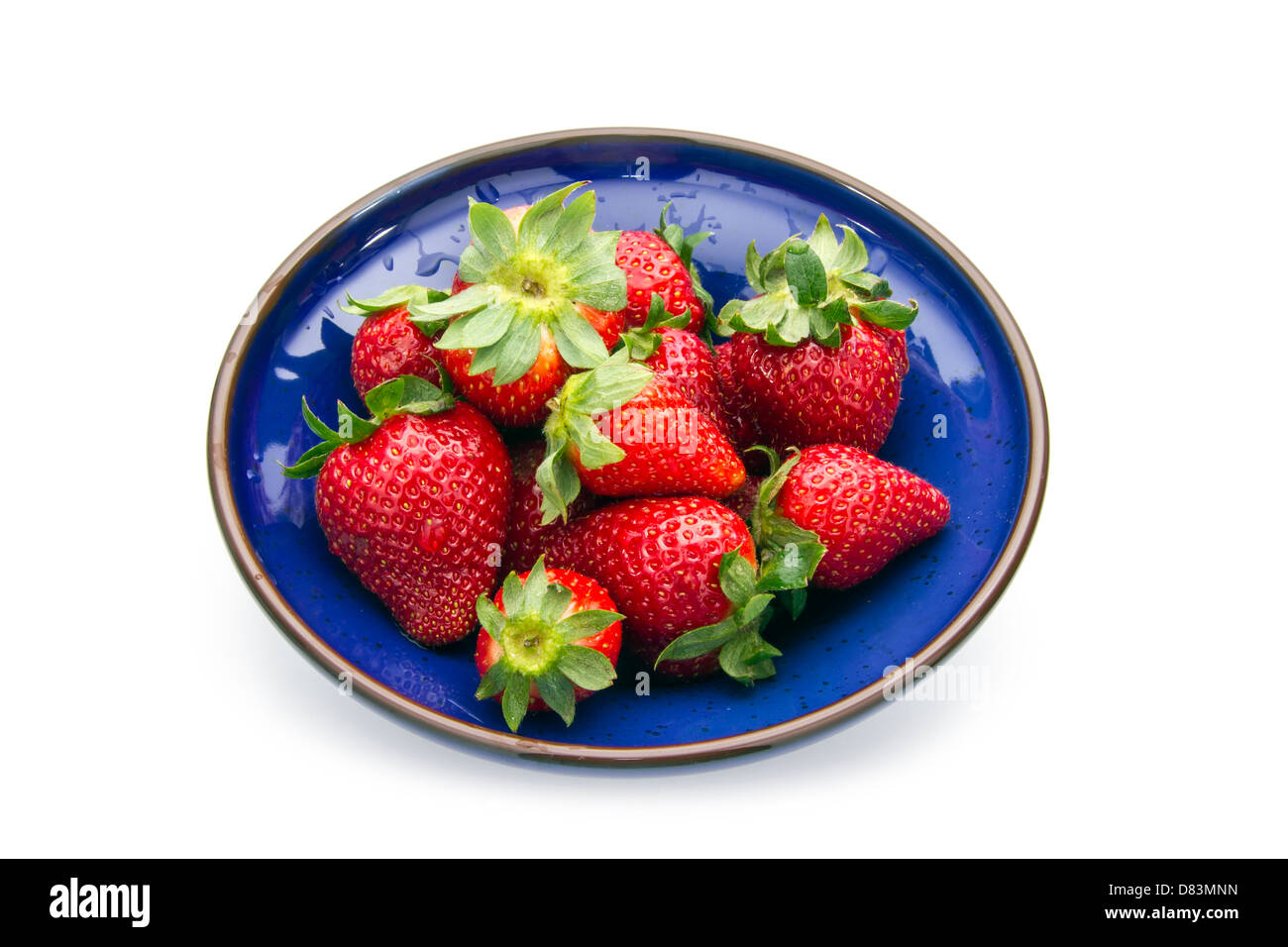 fresh strawberries in blue bowl isolated on white background Stock ...