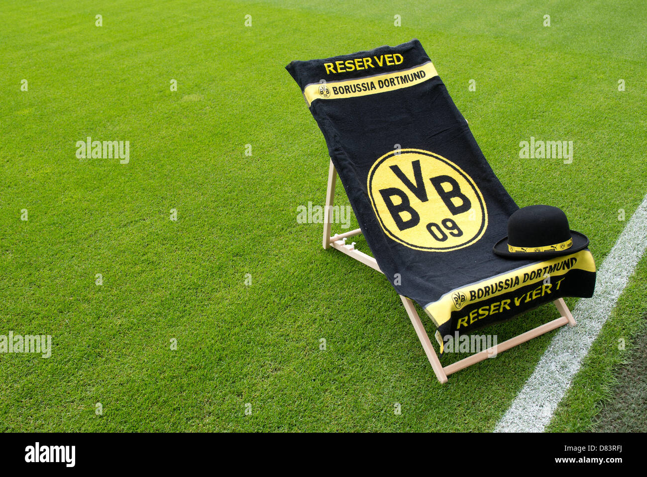 A deck chair with a BVB towel stands on the pitch as background for an  interview prior to the Bundesliga soccer match Borussia Dortmund vs 1899  Hoffenheim at Signal Iduna Park in