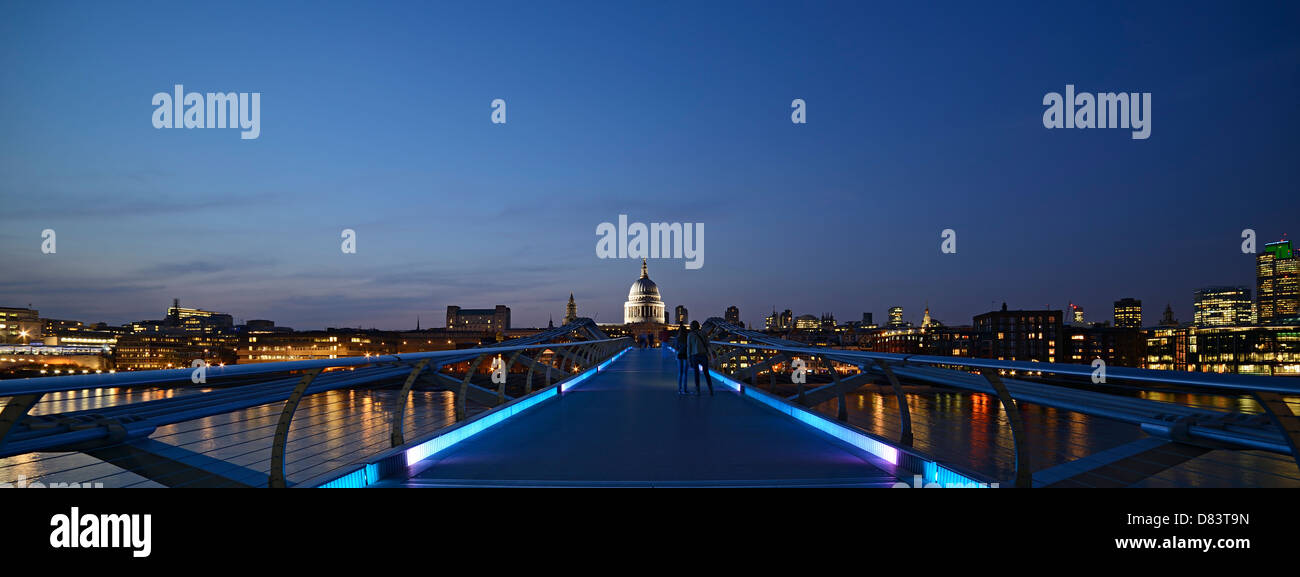 Millennium Bridge and London Skyline at Dusk, London, United Kingdom. Stock Photo