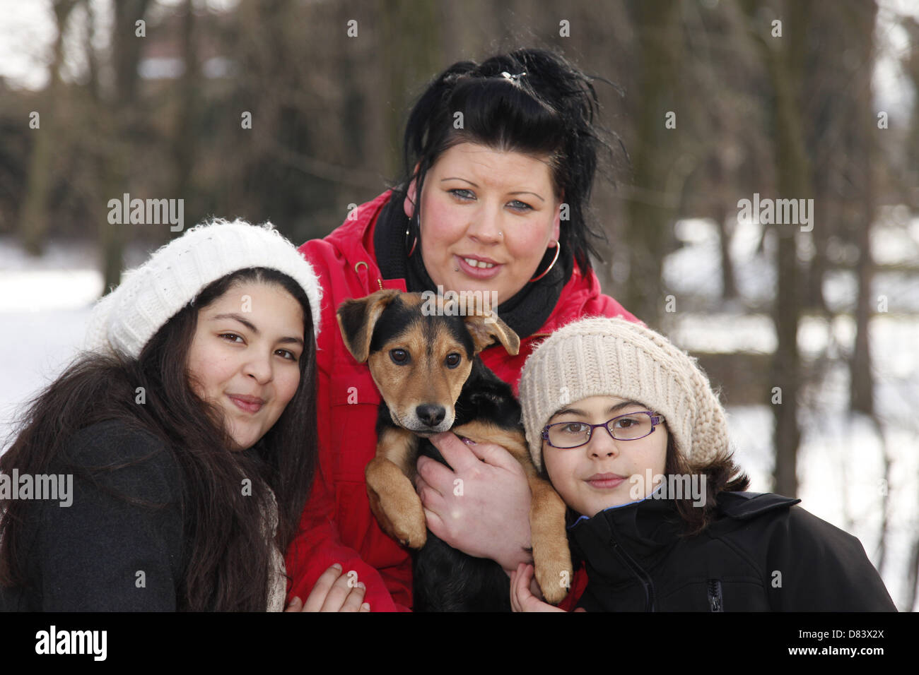family with dog Stock Photo