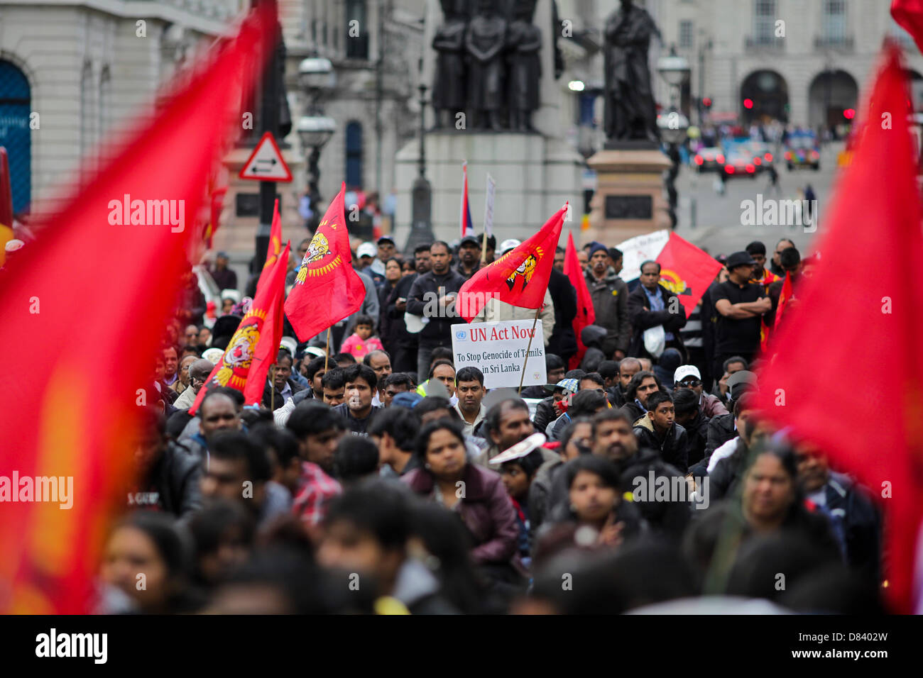London, UK. 18th May 2013. Thousands of Tamils march through central London to commemorate those killed during the final stages of the Sri Lankan civil war and to call on Prime Minister David Cameron to boycott the Commonwealth Heads of Government Meeting, to be held on Colombo in November 2013. Credit:  Rob Pinney / Alamy Live News Stock Photo