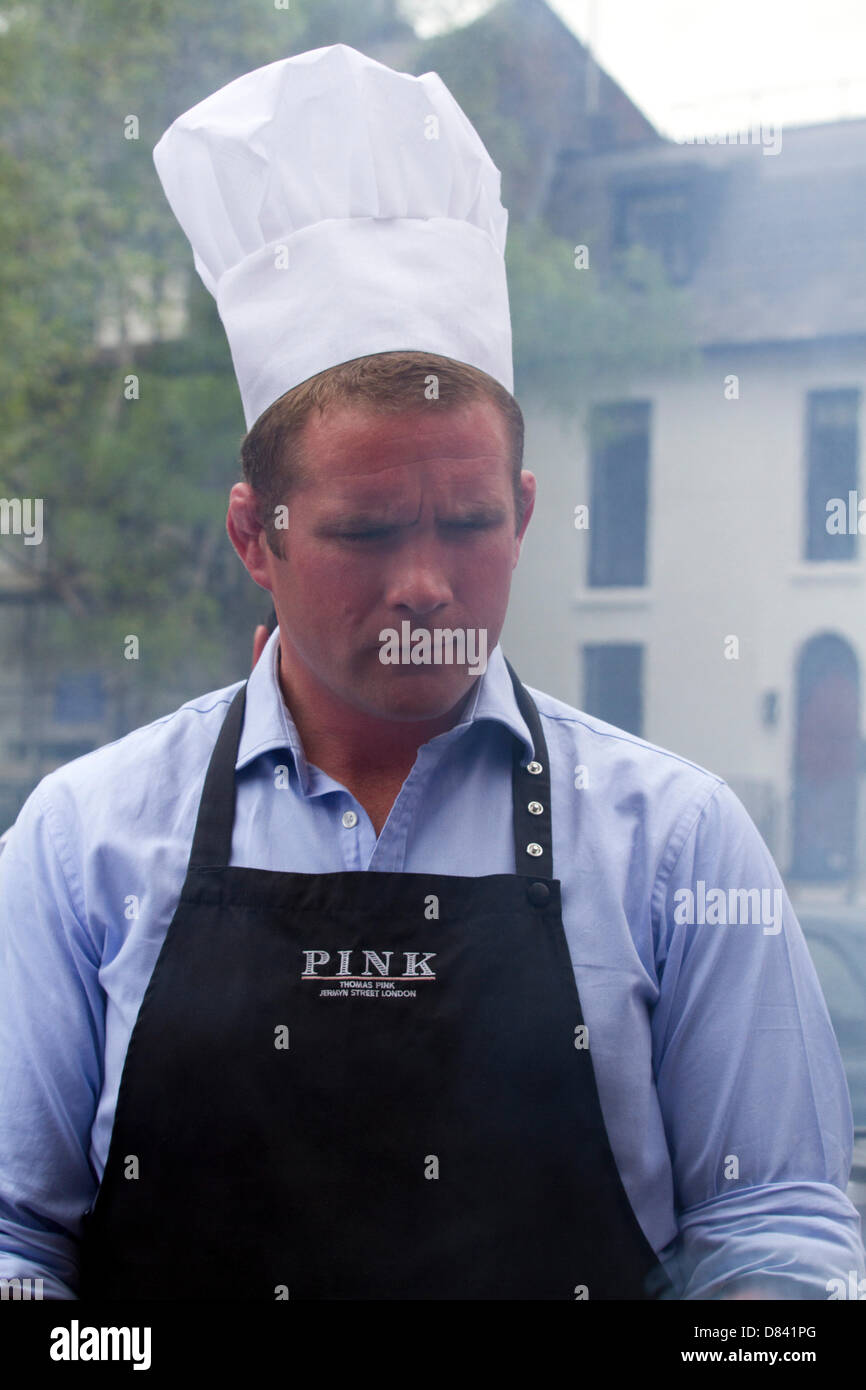 London, UK. 18th May 2013.  Celebrity Masterchef champion and British Lions veteran Phil Vickery mans a barbecue to celebrate the launch of the new British LIons collecton for the 2013 tour of Australia at the Pink Lion pub in South London Credit:  amer ghazzal / Alamy Live News Stock Photo