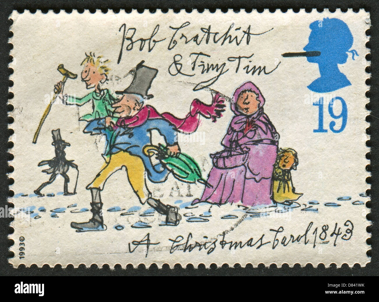 UK - CIRCA 1993: A stamp printed in UK shows image of the Bob Cratchit and Tiny Tim , circa 1993. Stock Photo