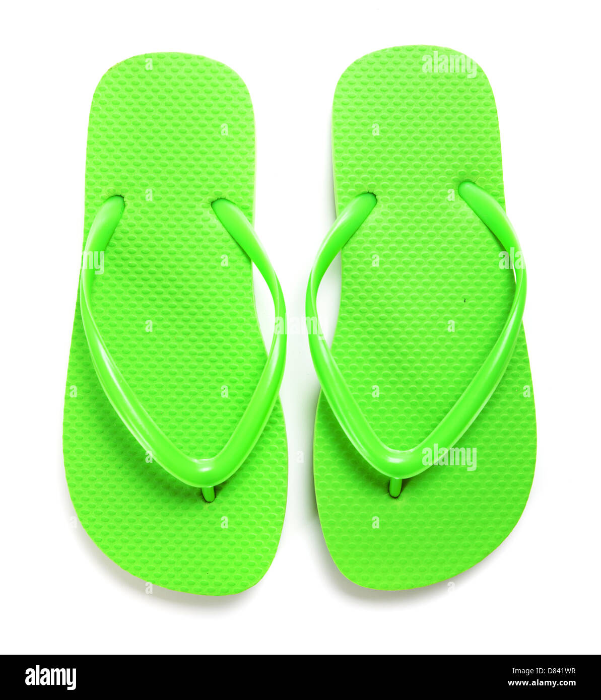 A pair of lime green flipflops on a white background Stock Photo - Alamy