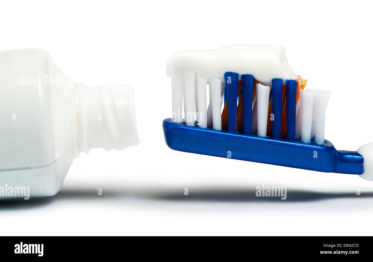 Blue toothbrush toothpaste white isolated studio shot Stock Photo Alamy