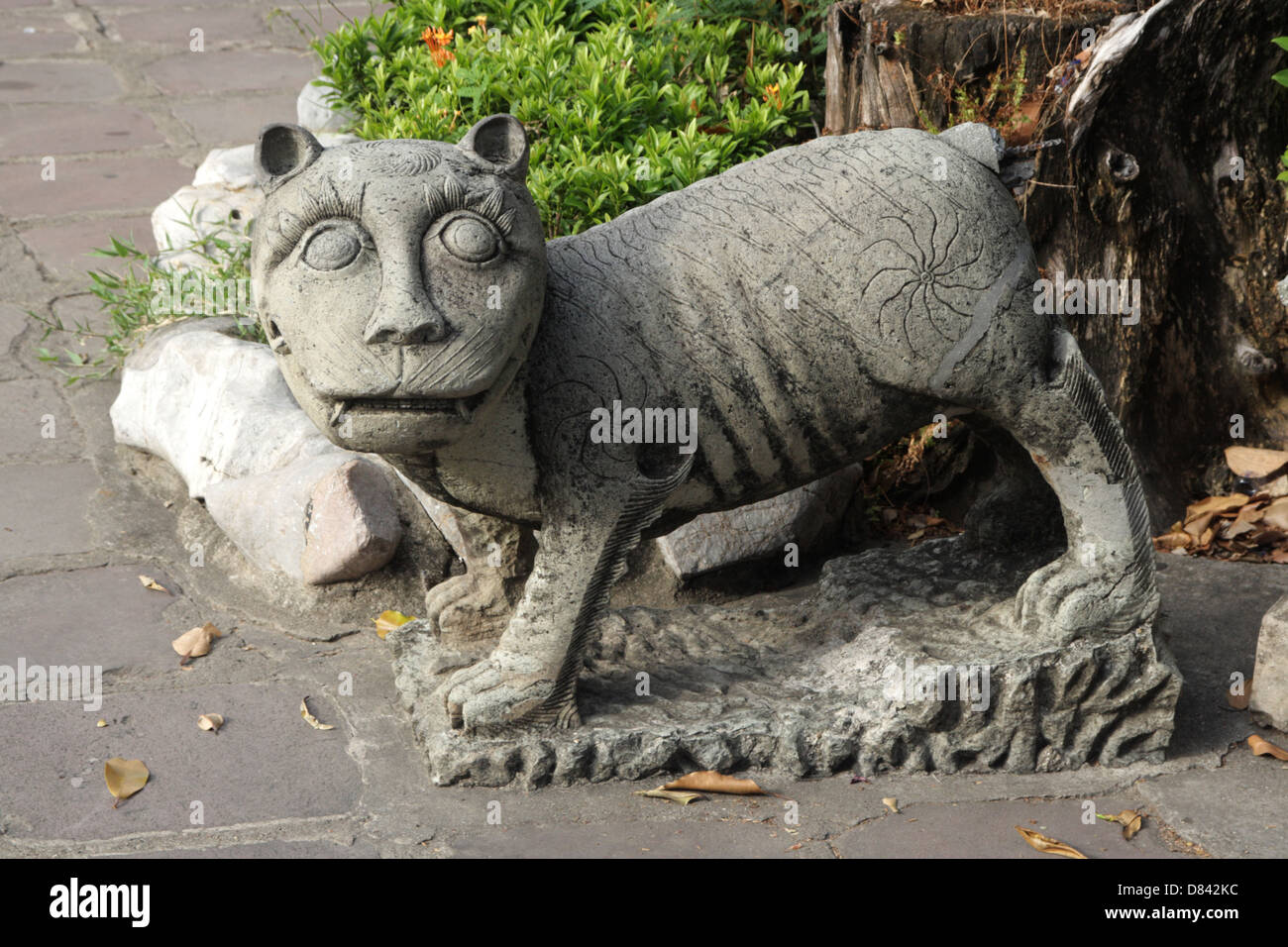 Old Chinese tiger statue at Wat Pho temple in Bangkok , Thailand Stock