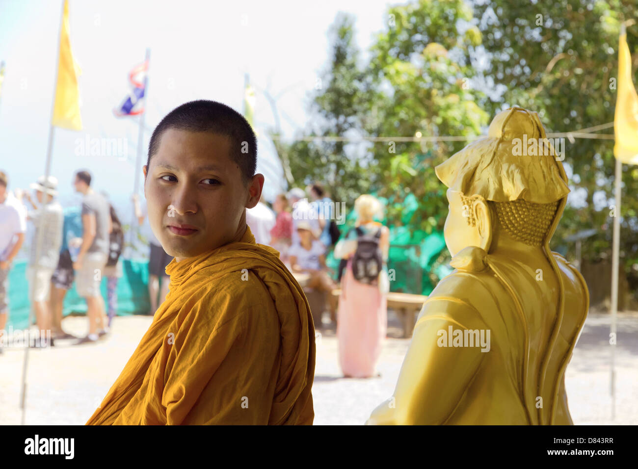 PHUKET, THAILAND FEBRUARY 15 2013: Buddhist monk visits the Big Buddha Monument in Phuket Stock Photo