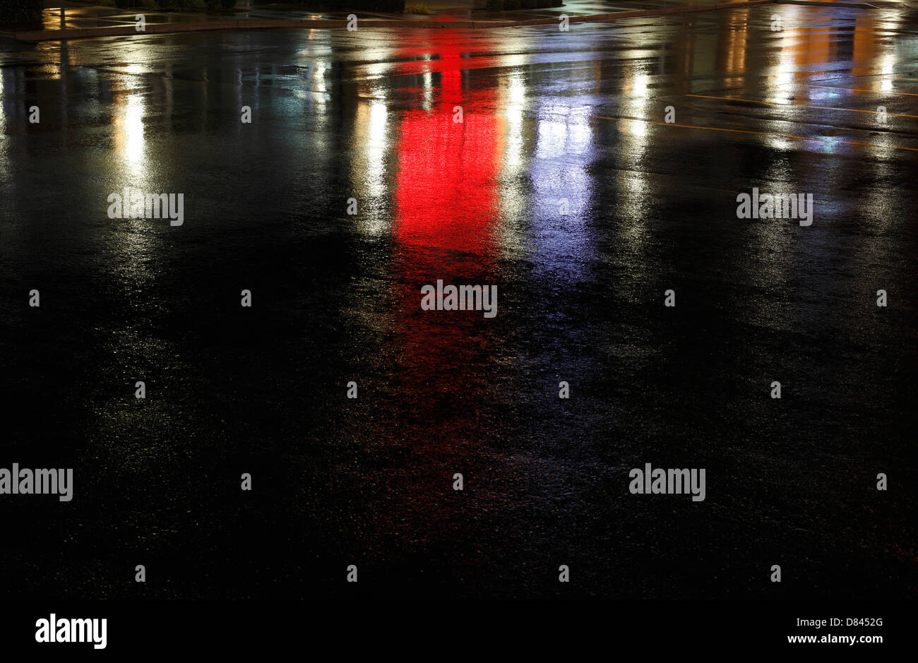 Neon lights reflecting on wet street Stock Photo Alamy