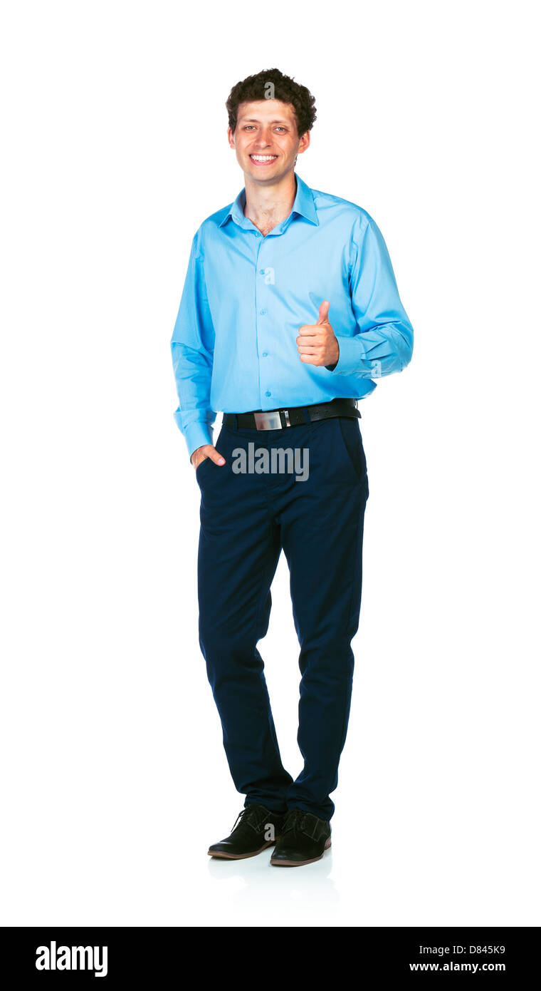Happy young businessman standing with thumb up on white background ...