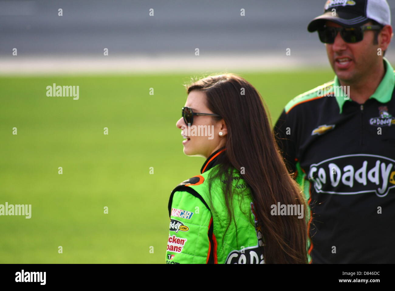 Charlotte, USA. 17th May, 2013. Danica Patrick looks down put road as cars begin to take their turn on the track during qualifying for the Sprint Showdown at Charlotte Motor Speedway on May 17, 2013. Credit:  Christopher Kimball/Alamy Live News Stock Photo