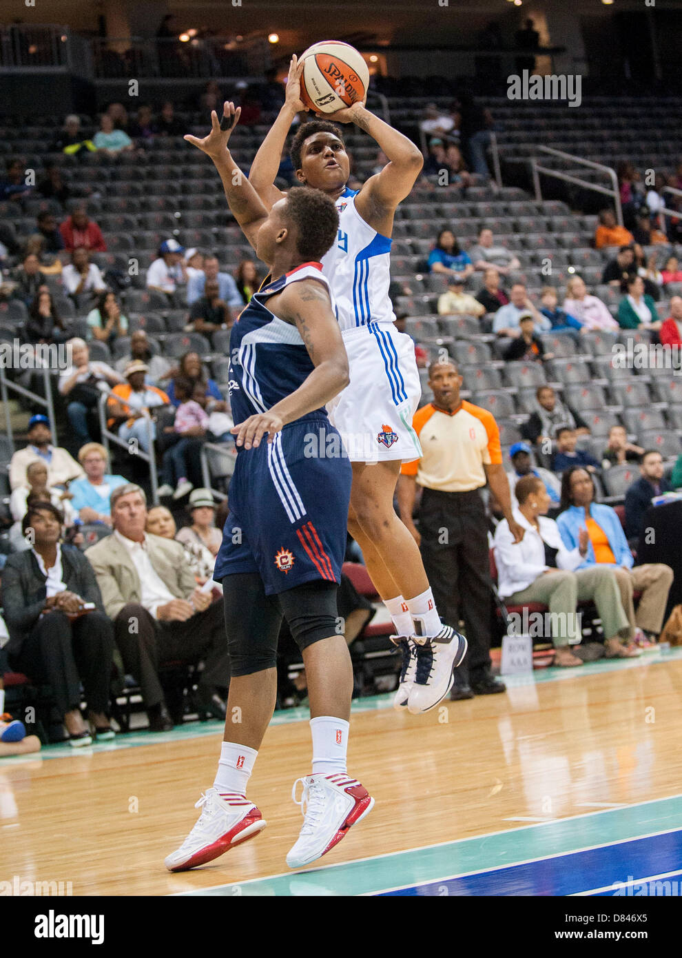 May 18, 2013 - Newark, New Jersey, U.S. - Liberty guard Kamiko Williams #4 shoots over Sun's guard Natasha Lacy #11 in the first half during WNBA action at the Prudential Center in Newark NJ. New York Liberty defeated the Connecticut Sun 78-67. Stock Photo